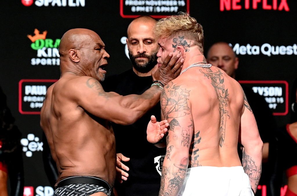 Mike Tyson, left, and Jake Paul face off during weigh-ins, held at Toyota Music Factory. Credit: By Stephen McCarthy/Sportsfile/Getty