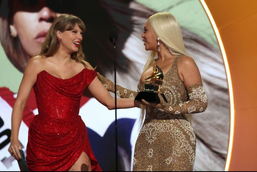Taylor presents Beyonce with the Country Album of the Year award.  Credit: Kevin Mazur/Getty Images for The Recording Academy