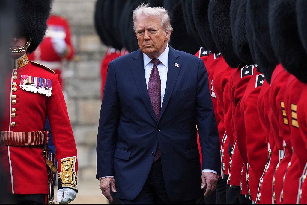 Trump broke protocol by walking ahead of The King. Credit: WPA Pool / Getty