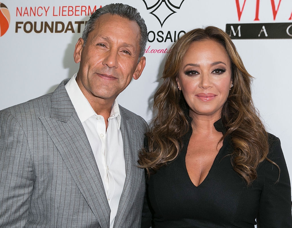 Angelo Pagan and Leah Remini