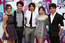 Alyson Stoner, Kevin Jonas, Joe Jonas, Demi Lovato and Nick Jonas arrive at the European TV premiere of 