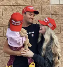 Erika and Charlie Kirk with their daughter.